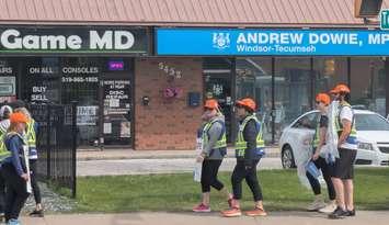 WSIB employees represented by CUPE picket outside Windsor-Tecumseh MPP Andrew Dowie's constituency office in Windsor, May 27, 2025. Photo by Mark Brown/WindsorNewsToday.ca.