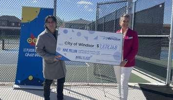 Councillor Renaldo Agostino and Kathleen Devine from the OLG celebrate last year's OLG contributions to the City of Windsor, April 30, 2025. (Photo by Maureen Revait) 
