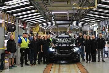 Representatives from Stellantis and Unifor show off the 100,000th Chrysler Pacifica Plug-In Hybrid at the Windsor Assembly Plant, August 31, 2023.