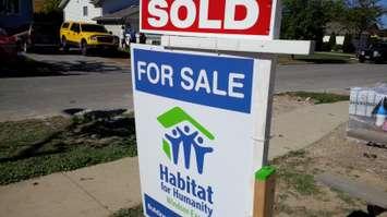 Habitat for Humanity sign outside a home in LaSalle.