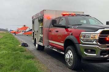 Emergency crews on scene of a single-vehicle crash on Pioneer Line near Stride Road in Dutton-Dunwich, April 23, 2024. Photo courtesy of the Dutton/Dunwich Fire Department on X