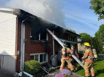 Firefighters on scene of a house fire at 1600 Nairn Ave., May 14, 2024. Photo provided by the London Fire Department. 