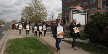 Public Service Alliance of Canada employees picket in front of the Canadian Border Service Agency building on Ouellette Avenue in Windsor, April 24, 2023. (Photo by   Maureen Revait) 