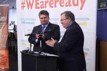 Windsor Regional Hospital CEO David Musyj (left) and Windsor Public Library Board Chair Peter Frise speak about a new partnership, March 6, 2017. (Photo by Mike Vlasveld)