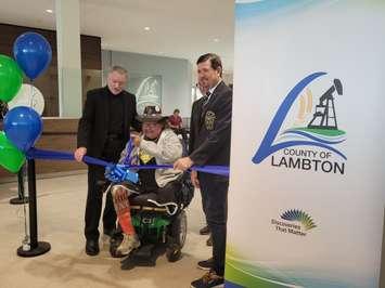 Ribbon cutting at Lambton Shared Services Centre Nov 23, 2022. (Sarnia Mayor Mike Bradley, Aamjiwnaang elder Mike Plain and Lambton County Warden Kevin Marriott. Blackburn Media photo by Stephanie Chaves.