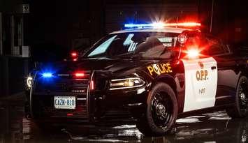 OPP cruiser with lights flashing. (Photo courtesy of @OPP_Hire via Twitter)