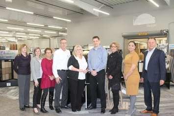 Staff of Sacwal Flooring Centres, Ideal Decorating, and The Lighting Shoppe at new facility in Chatham. April 4, 2018. (Photo by Sarah Cowan Blackburn News Chatham-Kent). 