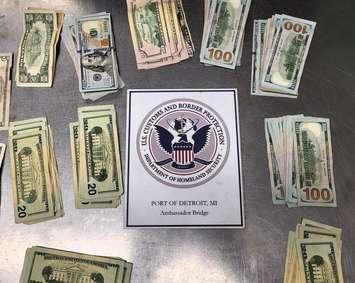 A seizure of $11,000 in U.S. currency is shown at the Ambassador Bridge, September 24, 2024. Photo courtesy US Customs and Border Protection Great Lakes/X.