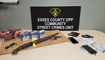 An assortment of weapons and ammunition seized by the OPP in a Leamington raid is shown on November 27, 2024. Photo courtesy Ontario Provincial Police.