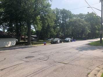 OPP cruisers are shown on Riverside Drive East in Tecumseh, where a man was reportedly seriously injured. Photo by Allanah Wills/Blackburn News.