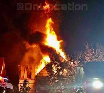 Flames shoot out of a vacant building on Wyandotte Street East near Pierre in Windsor, September 18, 2024. Photo courtesy Unofficial: On Location/X