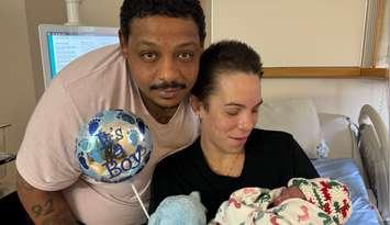 (Photo of Marissa Chase and Brandan Evans with their newborn son, Jupiter, courtesy of Windsor Regional Hospital)