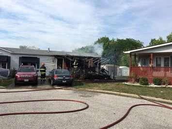 Firefighters respond to a house fire on Malden Hill Dr. in Amherstburg, July 28, 2016. (Photo courtesy of the Amherstburg Fire Department)