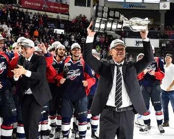 Trevor Letowski raises the Memorial Cup trophy following Windsor's 4-3 win over Erie. Sunday May 28, 2017. (Photo by Aaron Bell/CHL Images)