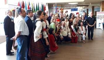 Representatives from all the "villages" in the 44th Carrousel of the Nations pose with Windsor Mayor Drew Dilkens at the Windsor International Aquatic and Training Centre, June 4, 2019. Photo by Mark Brown/Blackburn News.
