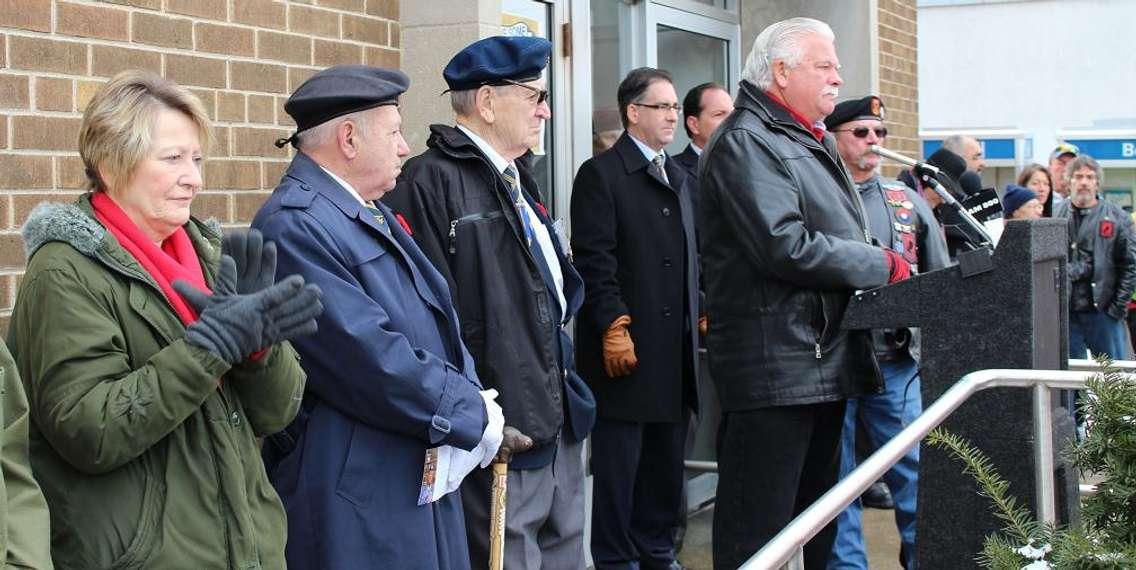 Windsor-Tecumseh MPP Percy Hatfield speaks to a crowd outside of Windsor's Veterans Affairs Canada office, January 31, 2014.