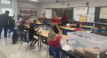 The United Way delivers lunches in a Grade 3 classroom at General Brock Elementary School, November 6, 2024. (Photo by Maureen Revait)