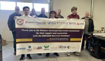 The Windsor Electrical Contractors Association presents donation to students at the Catholic Central High School Electrical Academy, May 8, 2025. (Photo by Maureen Revait)