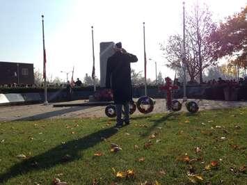 A veteran salutes the Leamington cenotaph. November 11, 2015 (Photo by Kevin Black)