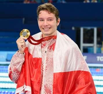 Nicholas Bennett gold medal ceremony for the Men's 100m Breaststroke SB14 Final at the 2024 Paralympic Games in Paris, France on September 2, 2024. (Image courtesy of Angela Burger/The Canadian Press/HO-Canadian Paralympic Committee)