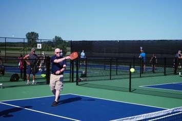 Mayor Doug Cook playing pickleball at the new pickleball and tennis court in Grand Bend (Photo by: Municipality of Lambton Shores)