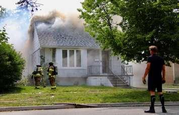 Windsor Fire & Rescue responds to a fire on Tourangeau Road. Photo courtesy of @_OnLocation_ via Twitter.