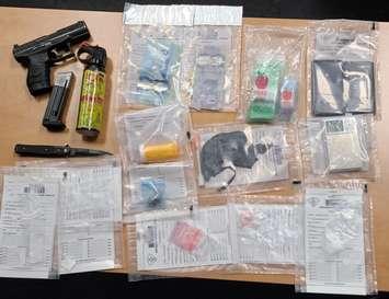 The OPP displays various drugs and weapons seized in a raid on April 15, 2021. Photo courtesy OPP.