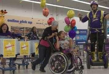 A child taking part in a 3-Minute Dash at Toys R Us.  (Photo courtesy of the Starlight Children's Foundation)