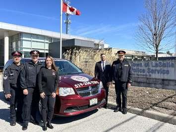 Representatives from LaSalle Police and the Windsor and Essex County Crime Stoppers, March 12, 2024. Photo courtesy LaSalle Police Service.