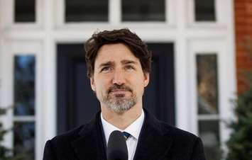 Prime Minister Justin Trudeau outside the front door of his Ottawa home. 28 March 2020. (Photo from Trudeau's Facebook)