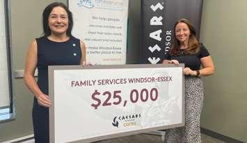 Susanne Tomkins with Caesars Windsor and Ciara Holmes with Family Services Windsor-Essex, July 24, 2024. (Photo by Maureen Revait)