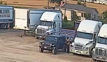 (Photo of suspects stealing a truck full of meat on August 2, courtesy of the Windsor Police Service)