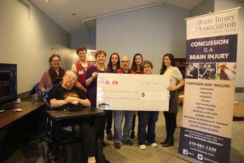 Lowe`s Canada Windsor East presents a cheque to the Brain Injury Association of Windsor and Essex County, February 18, 2020. (Photo by Maureen Revait)