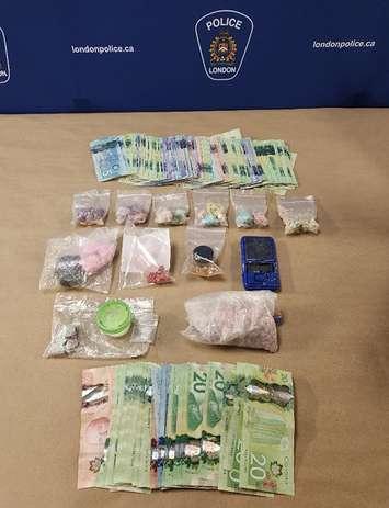 Drugs and cash seized by police during a search of a home on Hilton Avenue, September 29, 2023. Photo provided by London police. 
