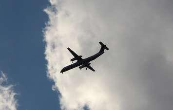 A passenger jet approaches Windsor International Airport for a landing, September 18 2014.  (Photo by Adelle Loiselle.)