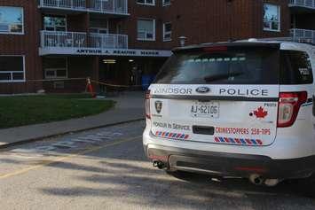 Windsor police cruisers park out front of the Arthur J. Reaume apartment building on Mill St. in Windsor after a stabbing incident, October 19, 2016. (Photo by Mike Vlasveld)