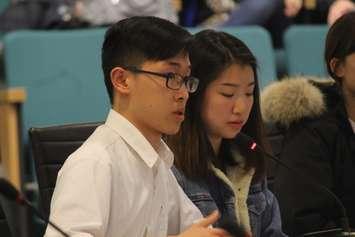 Academie Ste. Cecile International School students Jason Leung and Victoria Hung deliver a presentation to Essex town council on April 16, 2018. Photo by Mark Brown/Blackburn News.