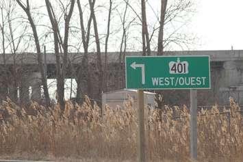 A sign directing drivers to the westbound 401 at Walker Road is seen in Windsor on March 7, 2016.