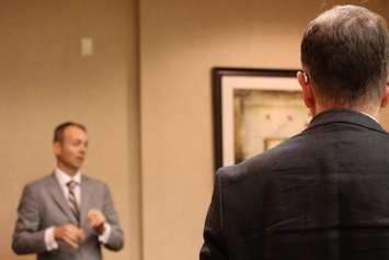 Lawyer Rob Talach and John, whose real name has not been released, speak to the press about the civil suit facing area priest Linus Bastien on Monday, November 16, 2015. (Photo by Alexandra Latremouille) 