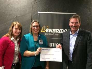Jodi Maroney, executive director of the Chatham-Kent Hospice Foundation (left), Melanie Watson,
volunteer coordinator, Steve Baker, president of Union Gas. (Photo courtesy of the Chatham-Kent Hospice Foundation).