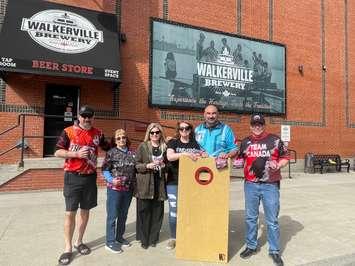 Organizers of the Tailgate Takeout Charity Corn Hole Tournament, April 10, 2024. (Photo by Maureen Revait)