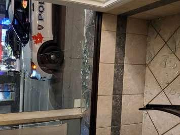A photo shows the damage at 10 Friends Diner after a vandal smashed the front window. February 27, 2021. (Photo courtesy of Carolyn Burton).