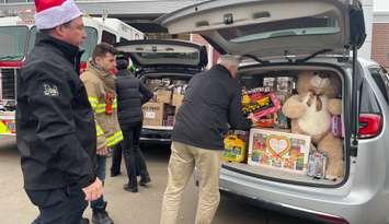 Windsor Assembly Plant employees deliver toy donations to Sparky's Toy Drive, December 18, 2024. (Photo by Maureen Revait) 