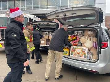 Windsor Assembly Plant employees deliver toy donations to Sparky's Toy Drive, December 18, 2024. (Photo by Maureen Revait) 