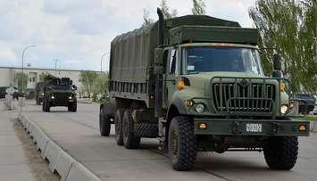 Military vehicles take part in a convoy drill. File photo courtesy of the Canadian Armed Forces.