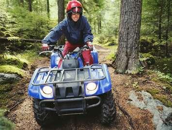 Woman riding ATV, Four wheeler