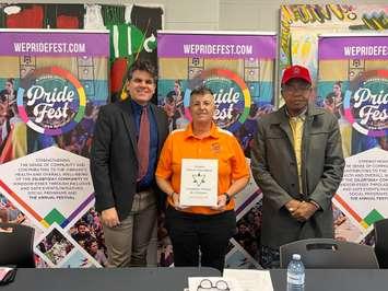 From left, Windsor-Tecumseh MPP Andrew Dowie, Windsor-Essex Pride Fest President Wendi Nicholson, and David Mboli of the Ontario Trillium Foundation, November 29, 2024. Photo provided by Windsor-Essex Pride Fest.