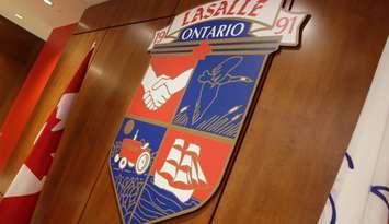 The Town of LaSalle's coat of arms hanging at LaSalle Town Hall. (Photo by Mike Vlasveld)