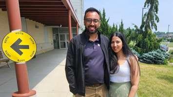 Arpan Khanna with his wife Sim outside of a polling station in Oxford County, June 19, 2023. Photo from Khanna on Twitter.