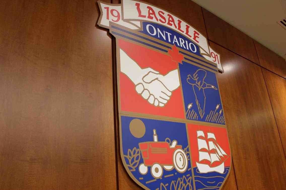 The Town of LaSalle crest hangs above the mayor's chair in Council Chambers at the LaSalle Civic Centre in this photo taken August 26, 2014. (Photo by Ricardo Veneza)